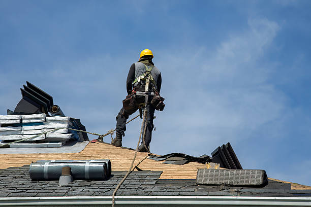Professional Gutter Installation technician working in Huntington, MA